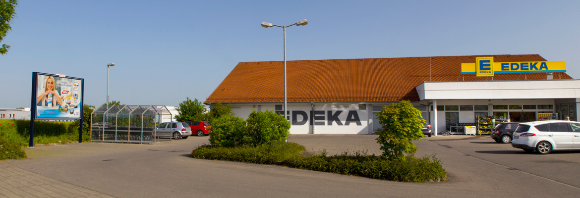 Plakatwerbung an einem EDEKA Plakatwerbung am P.O.S.