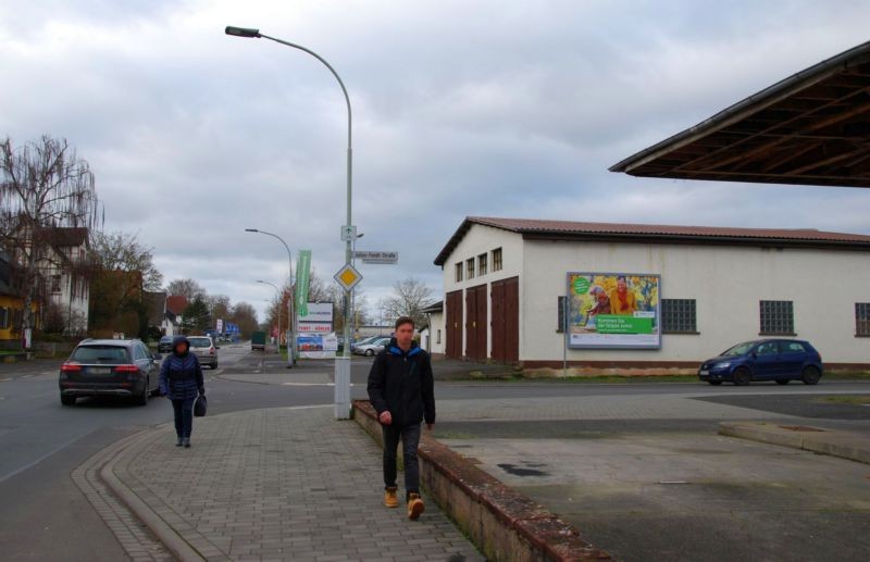 Gießener Str. 19/Julius-Fendt-Str/Zufahrt Rewe (quer)