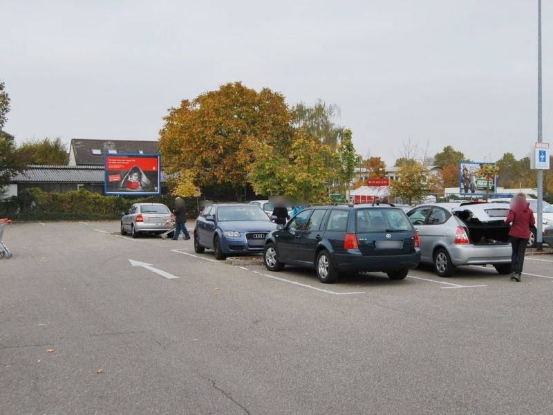 Theodor-Rehbock-Str.  11/REWE 1. von li. Si. Eing.