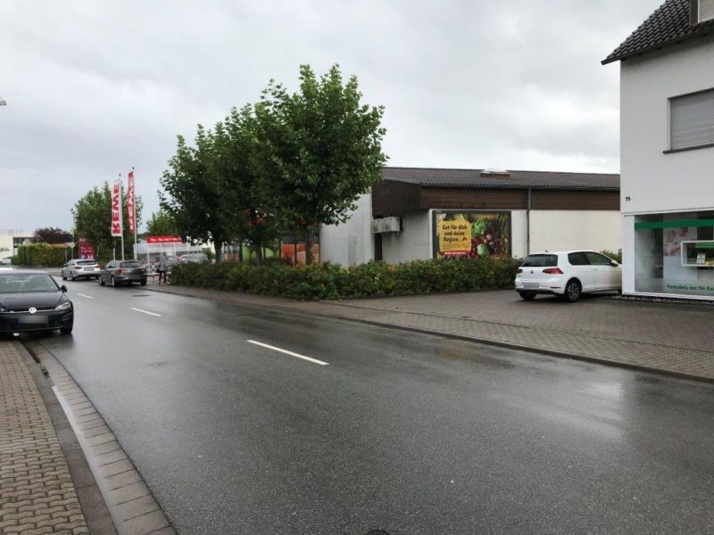 Kreisstr.  76-82/REWE/Wand quer/Sto. 3