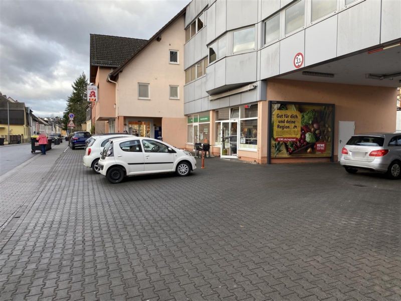 Ringstr.  33/REWE/Sto. 4