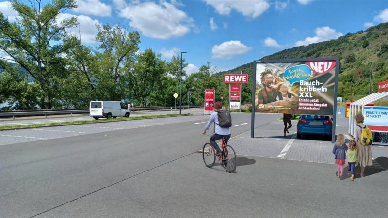 Rheinufertr.   1b/REWE PP Si. Einf.